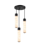On a white background, three black-capped alabaster tubes hang at staggered heights from this Clérachic pendant.