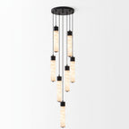 Clustered from a round black plate, this Clérachic pendant's alabaster tubes cascade in a tall multi-tube arrangement.