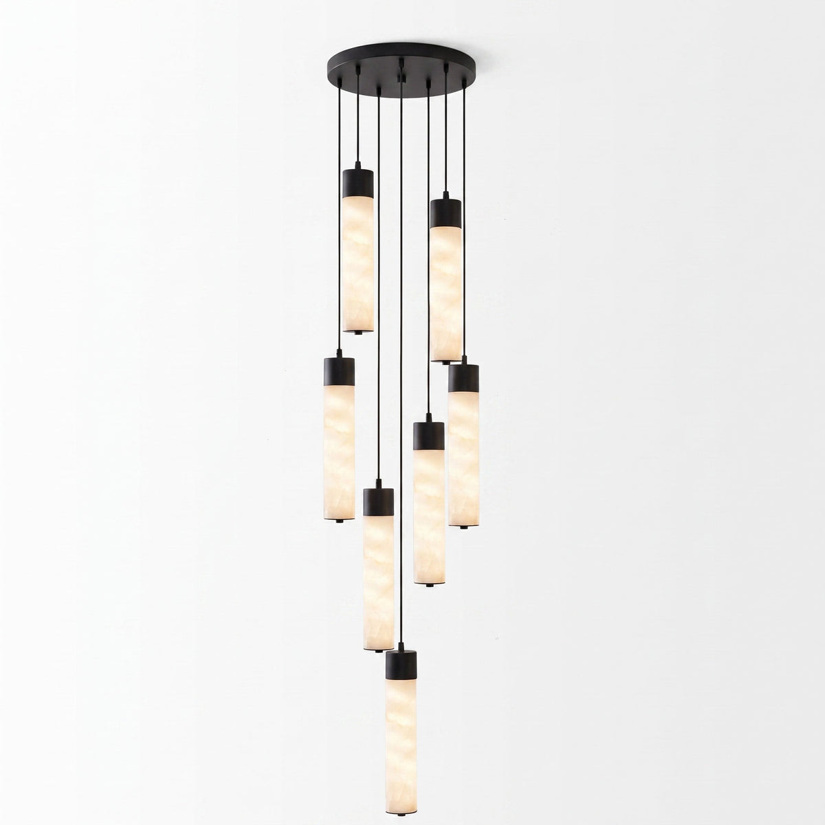 Clustered from a round black plate, this Clérachic pendant's alabaster tubes cascade in a tall multi-tube arrangement.