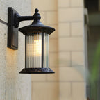 Silas Outdoor Wall Sconce, Coffee-Gold Aluminum, Frosted Glass Shade