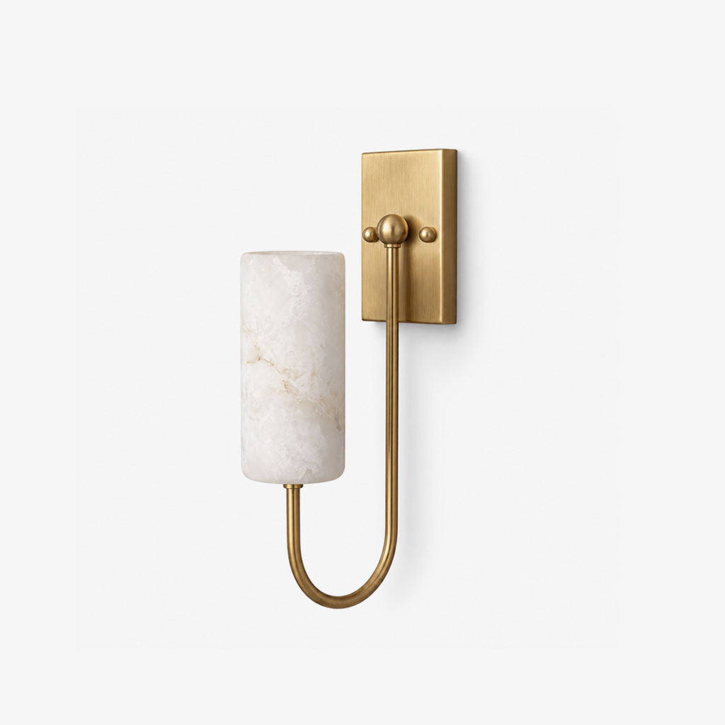 This Clérachic alabaster sconce in brushed brass sits unlit, shown alone against a plain white backdrop.