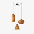 This three-arm canopy Clérachic cluster spreads a cylinder, a pumpkin-round, and a cone rattan shade apart.