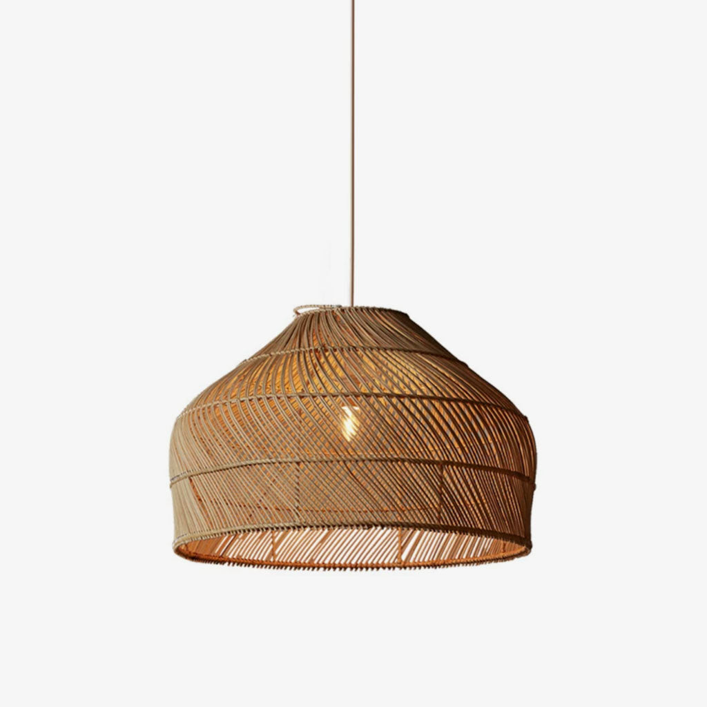 Product view of this Clérachic pendant, its diagonal rattan weave and fringed base rim shown against a plain background.