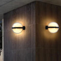 Lampe murale ronde LED Sirea, corps en fer design nordique minimaliste