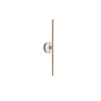 Clérachic wall sconce on white, its pale alabaster disc set near the top of a full-length brass bar.