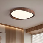 Walnut ceiling light close detail showing the wood grain edge