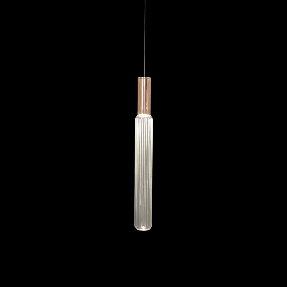 A copper-toned gold rod suspends this Clérachic pendant's fluted glass cylinder.