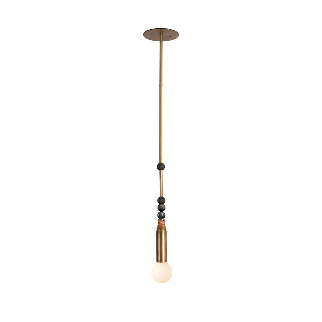 The Clérachic pendant light in its dark marble bead finish, shown full length on a plain backdrop.