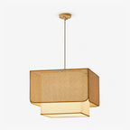 Product view of this Clérachic pendant's woven rattan lattice box shade sitting over a glowing fabric diffuser panel.