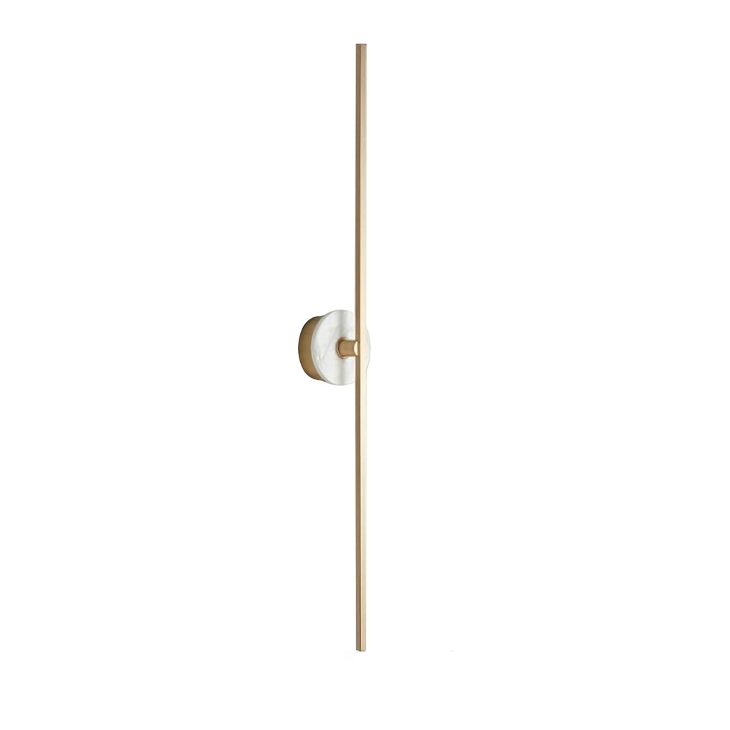 Clérachic wall light shown alone on white, a pale alabaster disc set near the top of its full-length brass bar.