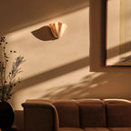 Petalia wall sconce styled close-up with soft diffused lighting