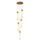 This Clérachic pendant's five brass-capped alabaster tubes cascade from a round brass plate on a white background.