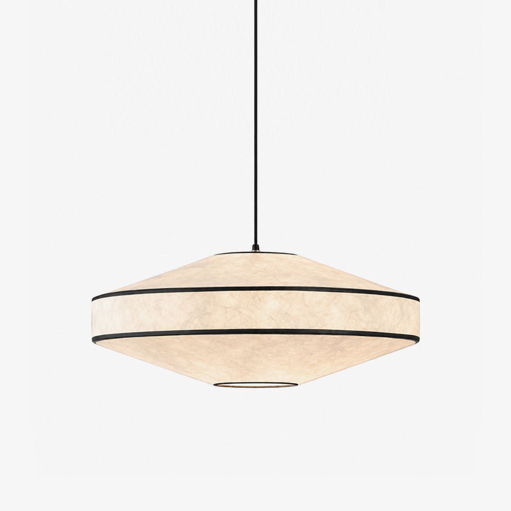 This Clérachic pendant's diamond paper shade, banded in black trim, hangs from a black cord and canopy.