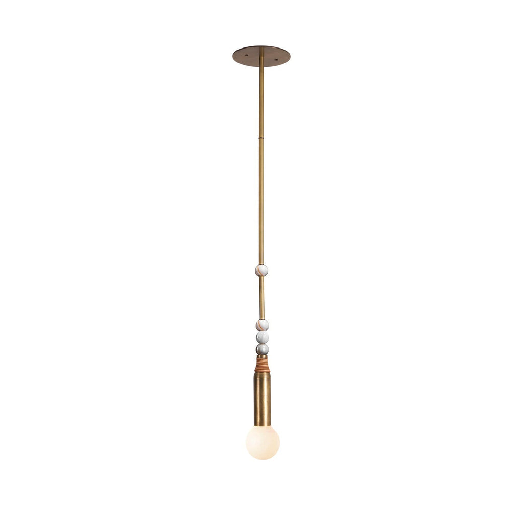 The Clérachic pendant light in its pale marble bead finish, photographed alone on a neutral background.