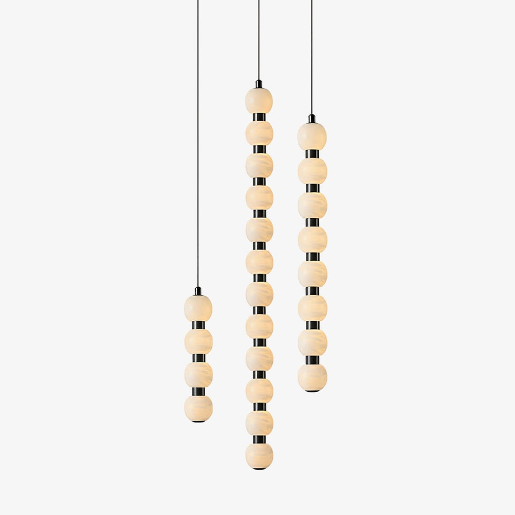 All three Orbique lengths side by side, with four, twelve and eight alabaster balls at staggered drops
