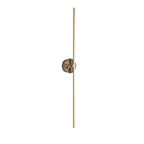 Clérachic wall light on white, a mottled brown stone disc set at the midpoint of its slim brass bar.