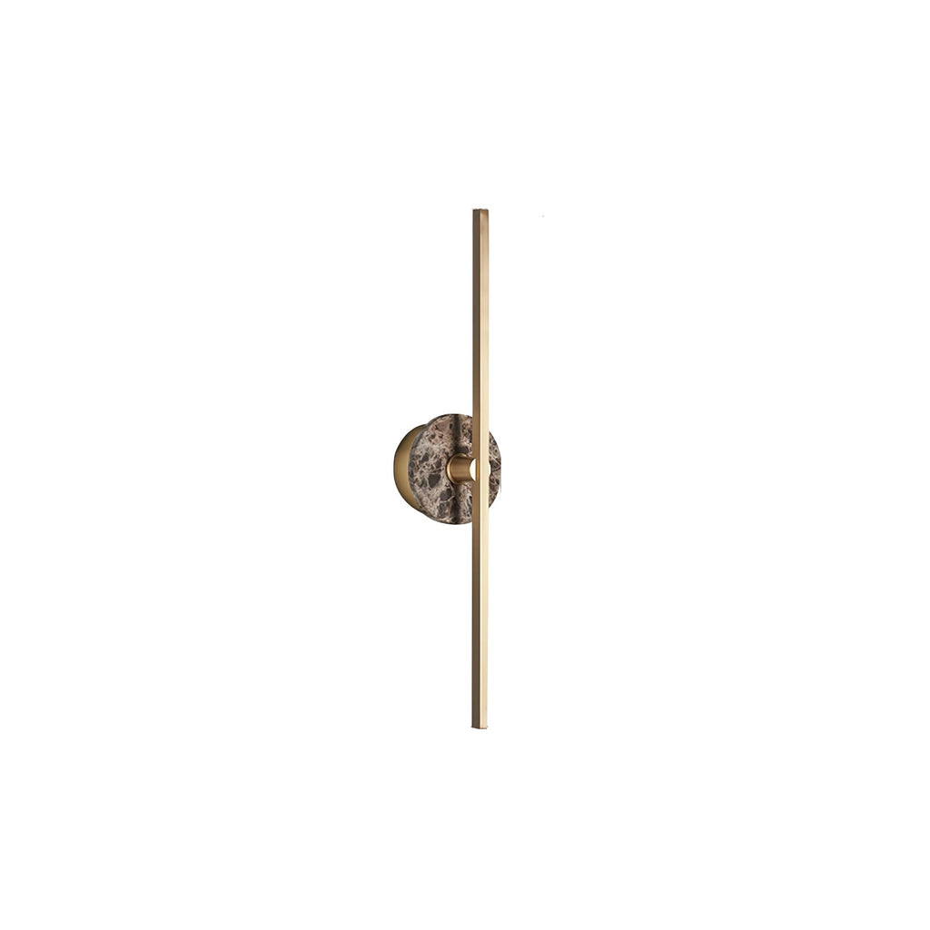 Clérachic wall sconce on white, a pink-brown marbled disc shown close against its slim brass bar.