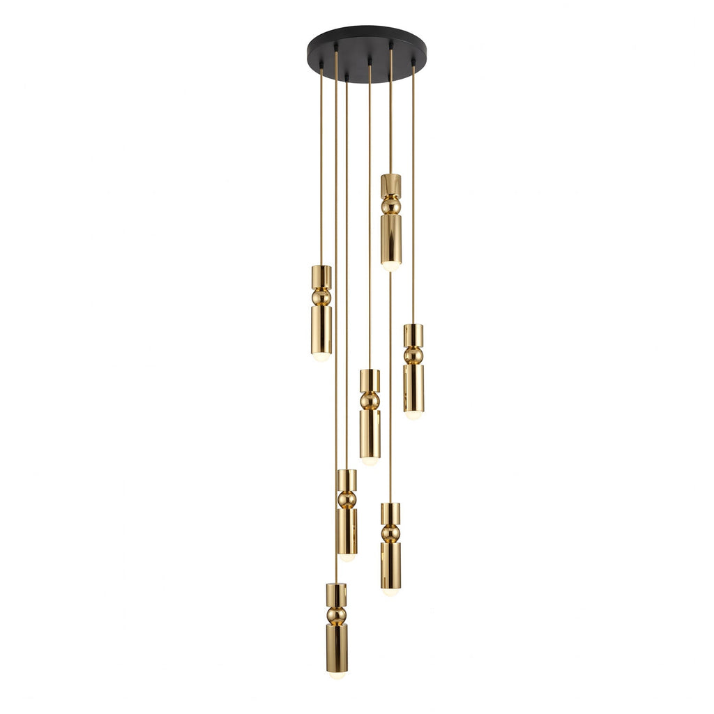 Seven head geometric pendant light suspended over a table