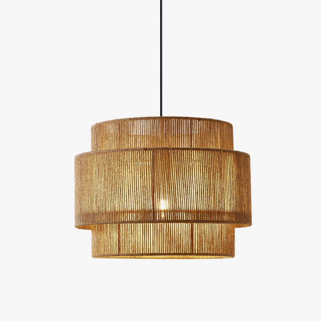 Isolated on a plain grey backdrop, this Clérachic pendant shows its three stepped rope-wound tiers glowing warmly from within.