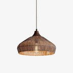 Product view of this Clérachic pendant, its dark tapered cap and bulging rattan dome shown against a plain background.