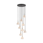 A dense cluster of alabaster domes cascades unlit from a round black ceiling plate, staggered lengths shown on this Clérachic pendant.