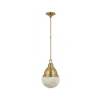 A brushed brass version of this Clérachic pendant sits on a plain white background, showing the ball shade's shape.
