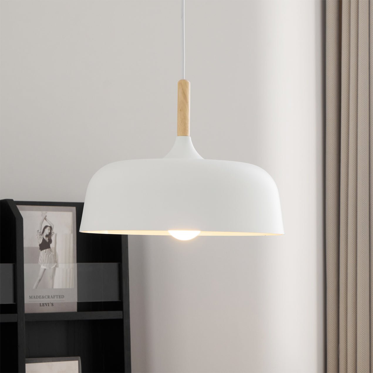 Acorn pendant lamp pair grouped above a table