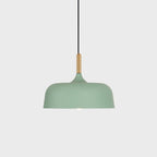 Acorn pendant light cluster arranged over a dining space