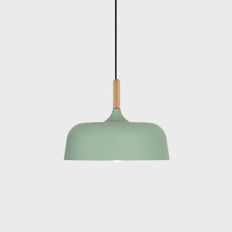 Acorn pendant light cluster arranged over a dining space