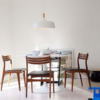 Acorn pendant light suspended above a kitchen counter