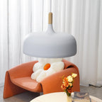 Acorn pendant light close detail of the warm oak base