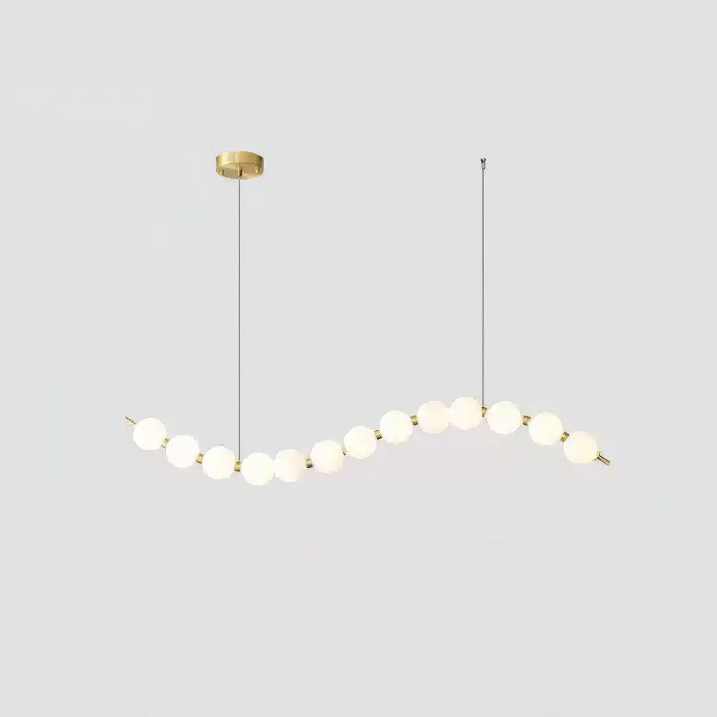 Acrylic pearl chandelier with clustered orbs and warm glow