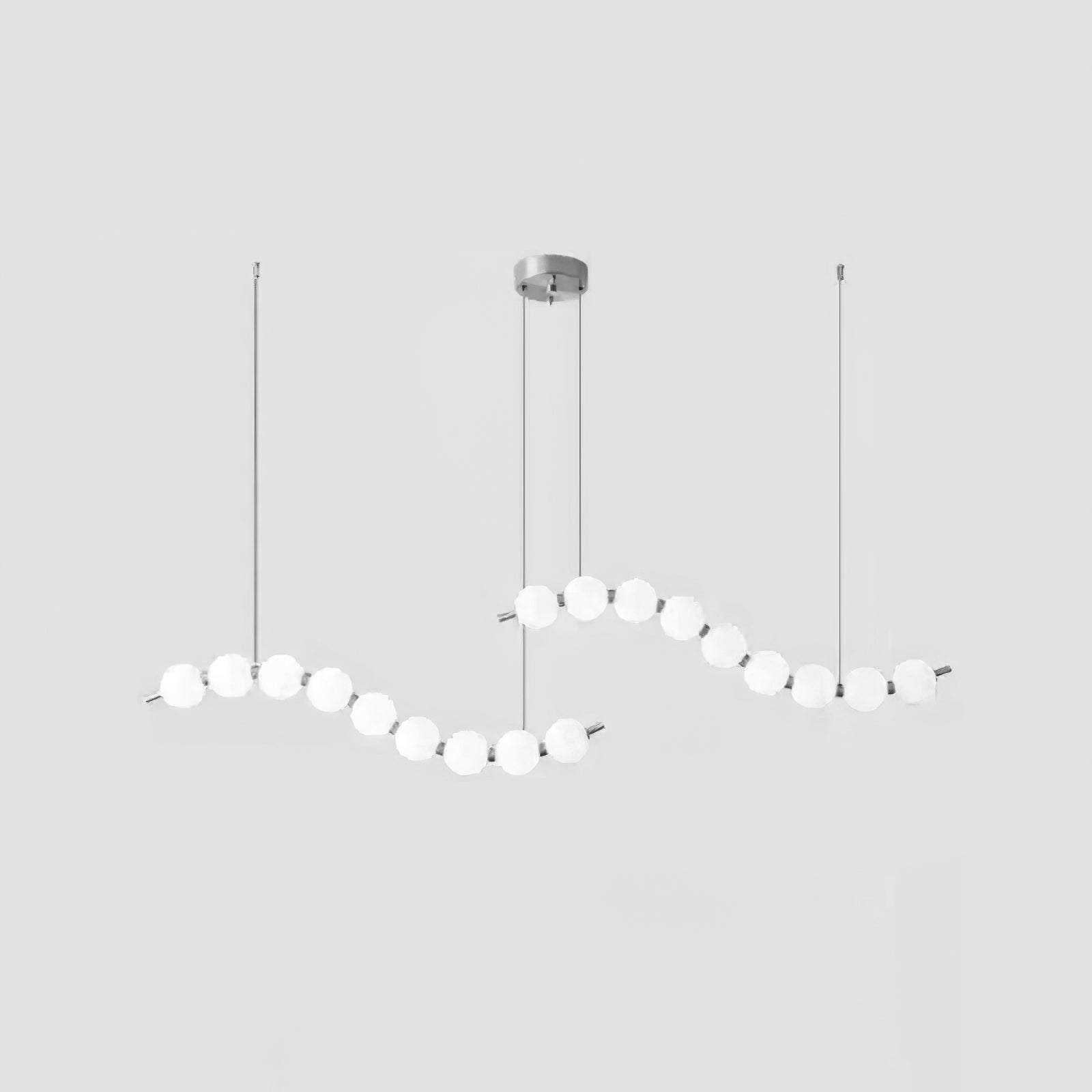 Acrylic pearl chandelier with clustered white orbs glowing warmly