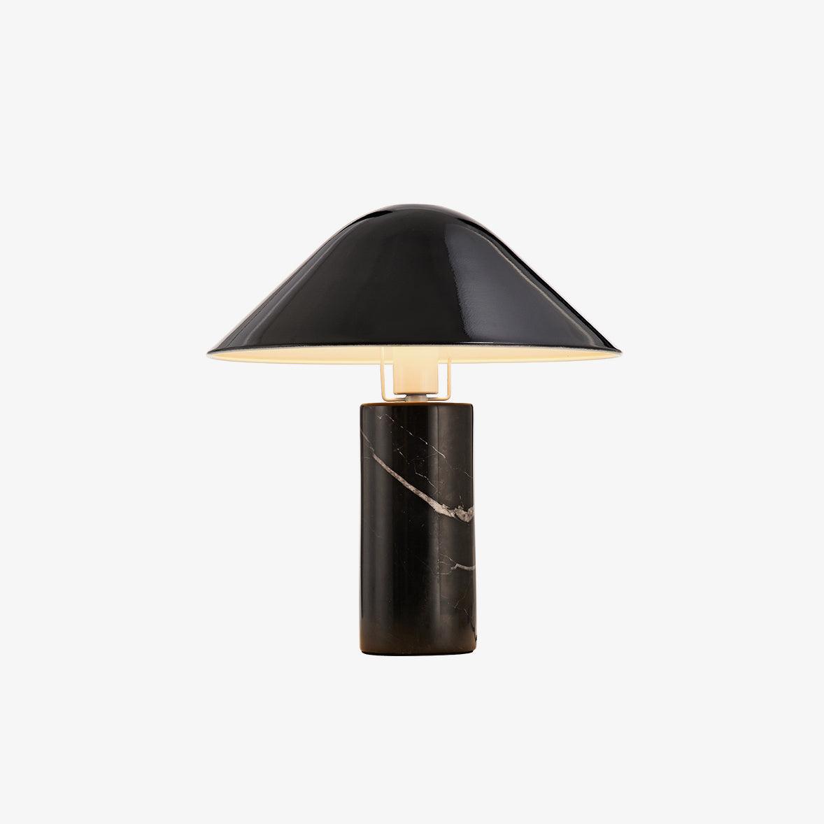 Clérachic black marble table lamp with its angled black shade photographed against a plain white studio background.