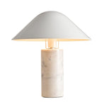 The marble column's veining catches the light on this Clérachic white marble table lamp, lit on a white studio background.