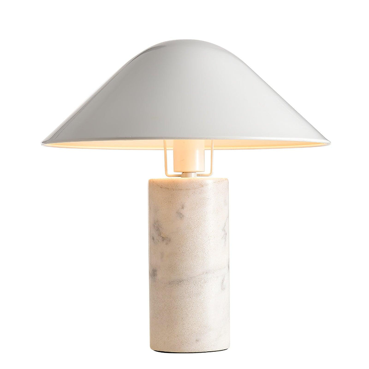 The marble column's veining catches the light on this Clérachic white marble table lamp, lit on a white studio background.