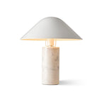 A straight-on view shows this Clérachic white marble table lamp lit against a plain white studio background.