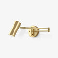 Side view of the brushed brass swing-arm wall sconce on a white background, arm extended and head tilted.