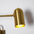 Swing arm wall lamp detail of the black shade interior