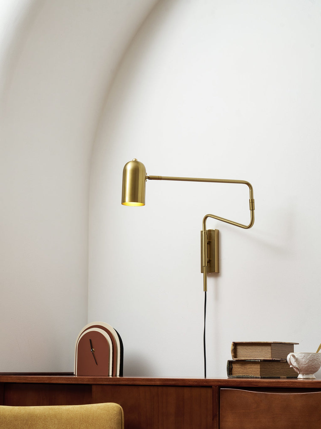 Swing arm wall lamp detail of the shade and bulb socket
