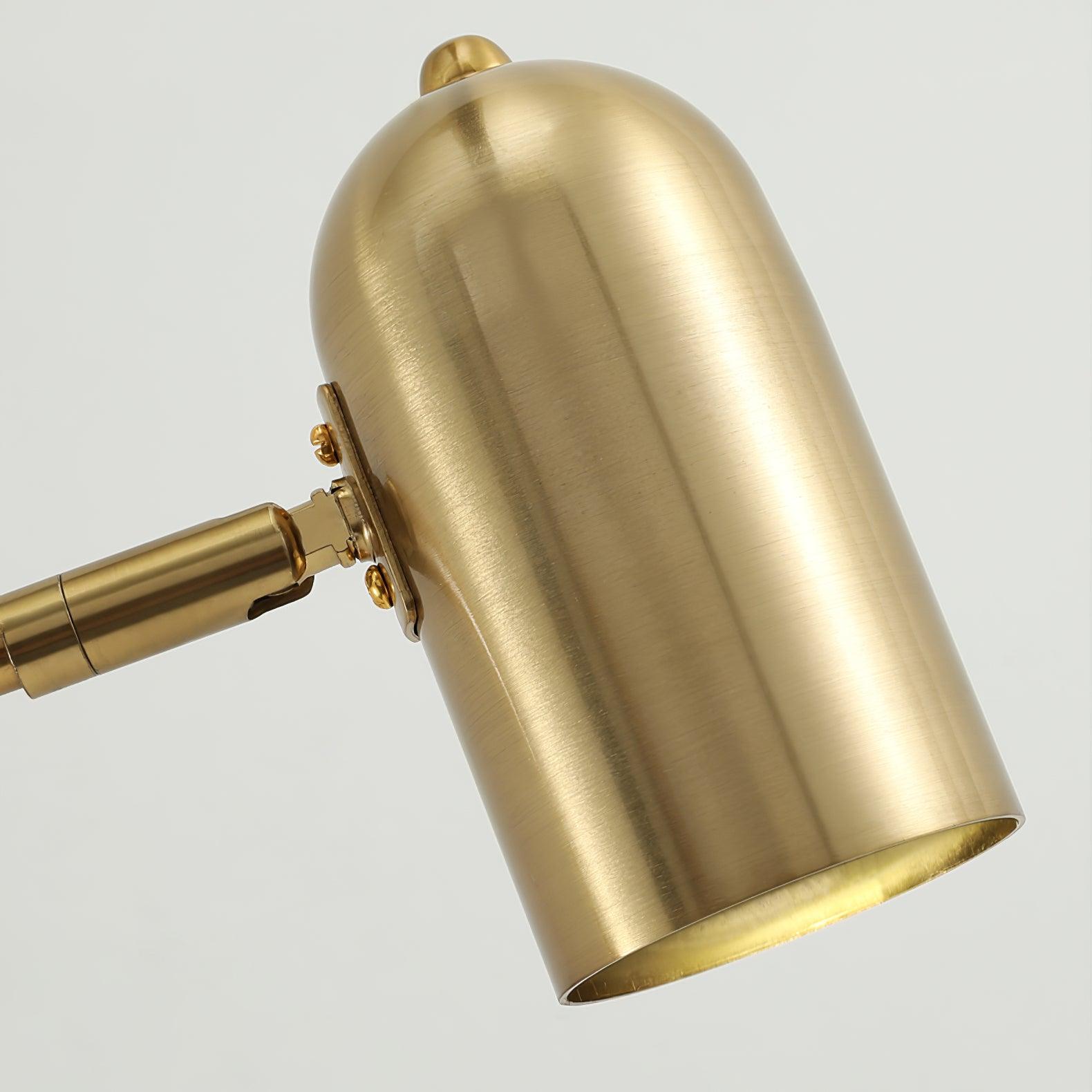 Swing arm wall lamp shown casting warm reading light