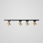 Track ceiling light mounted along a modern ceiling