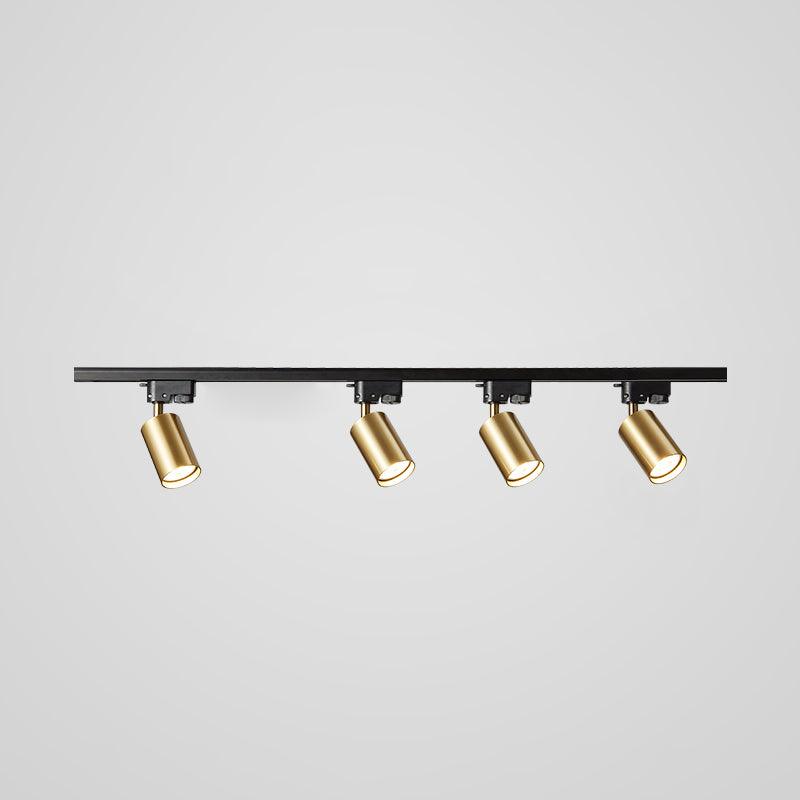 Track ceiling light mounted along a modern ceiling