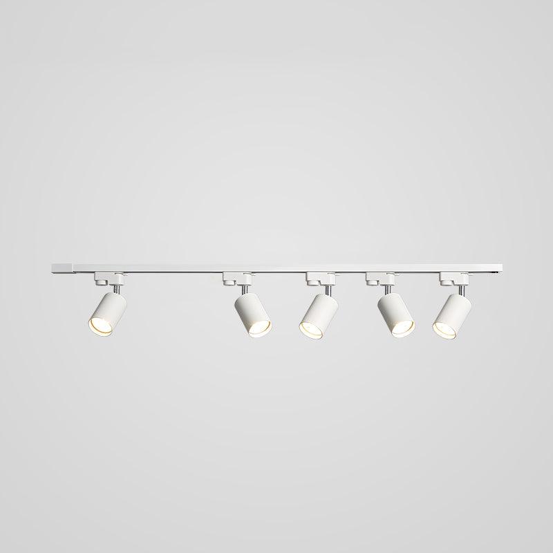 Track ceiling light spotlights highlighting a kitchen counter