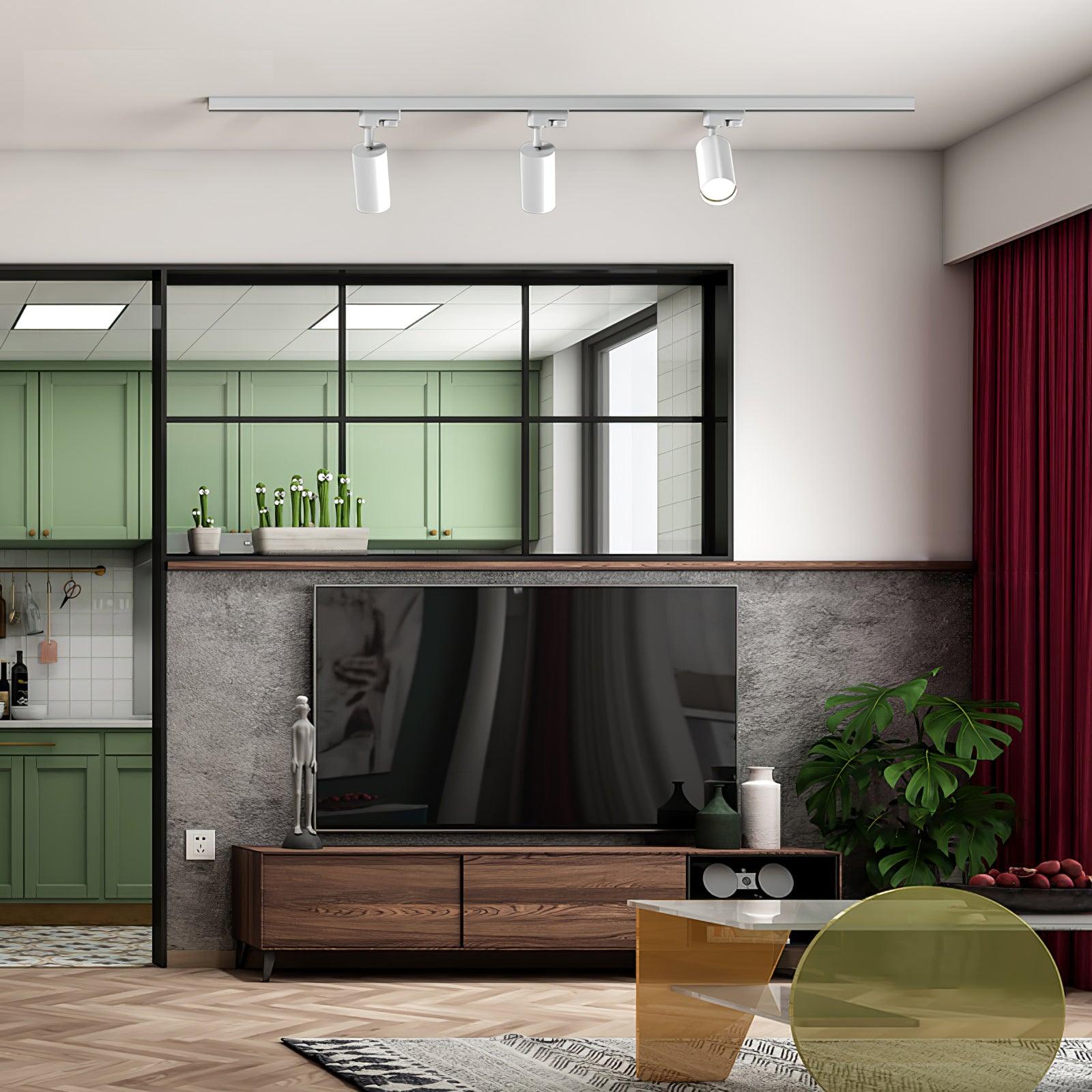 Track ceiling light shown lit in a warm interior setting