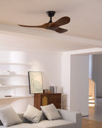 Wooden propeller ceiling fan shown from below on white