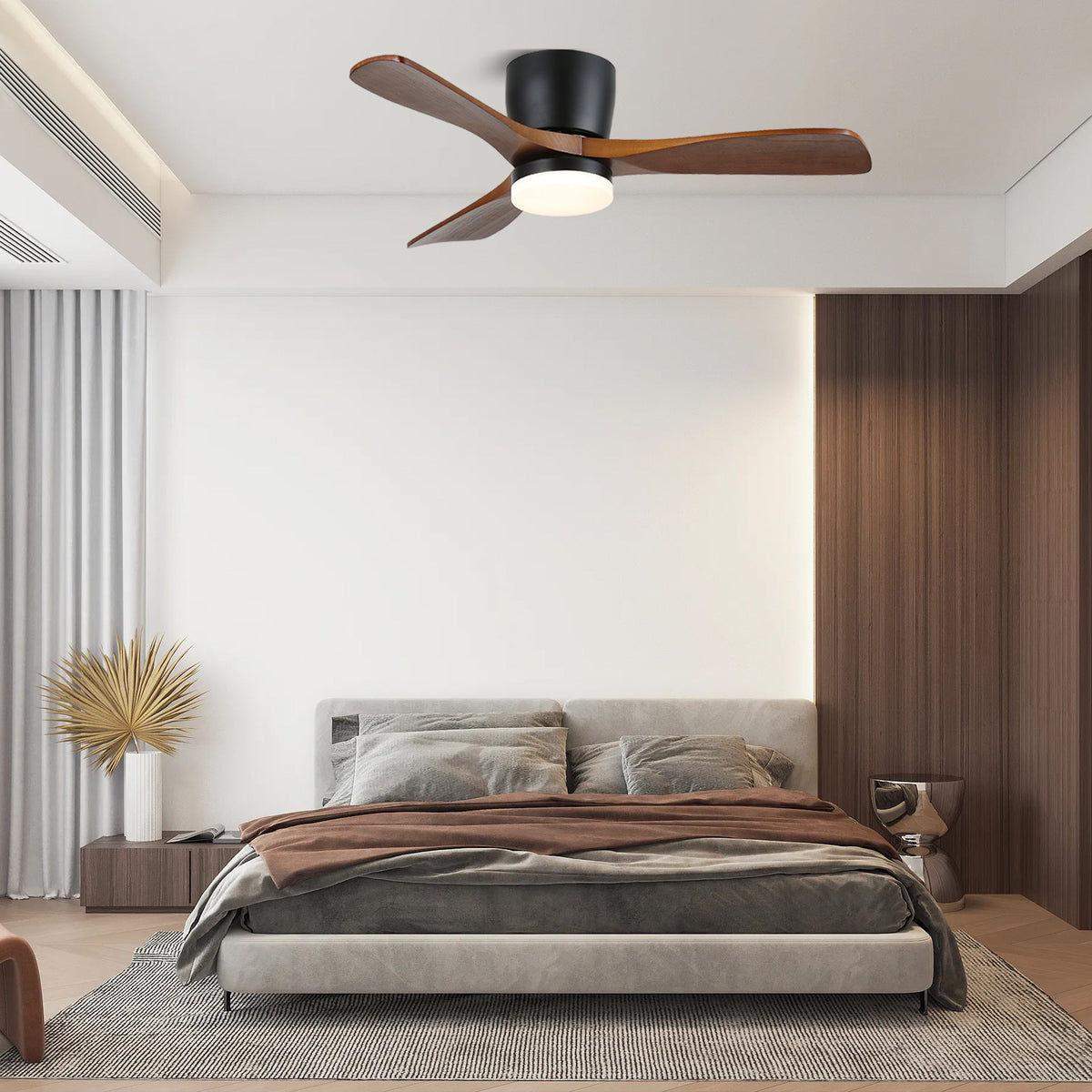 In a warm-toned bedroom, this Clérachic ceiling fan glows warm with walnut wood-grain blades and a black motor housing.