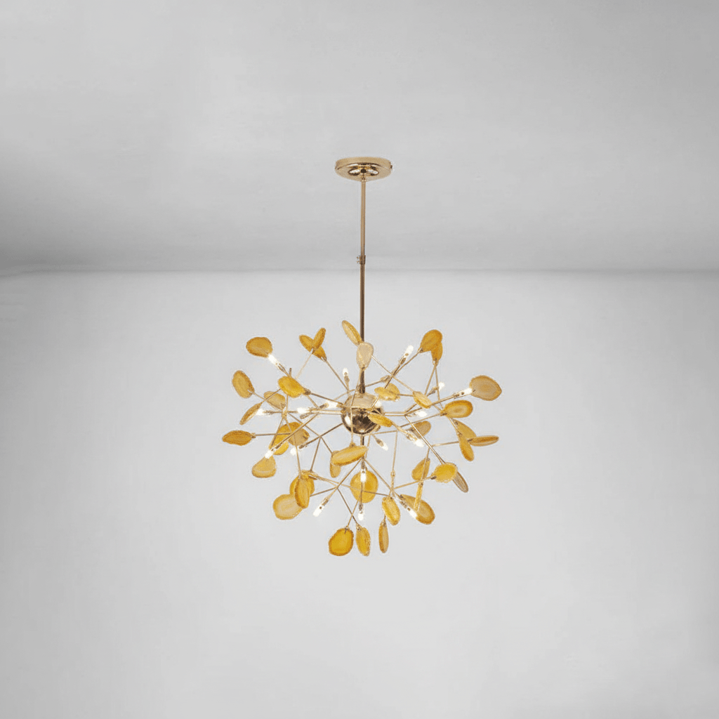 Agate slice chandelier with rose gold arms in a bright room