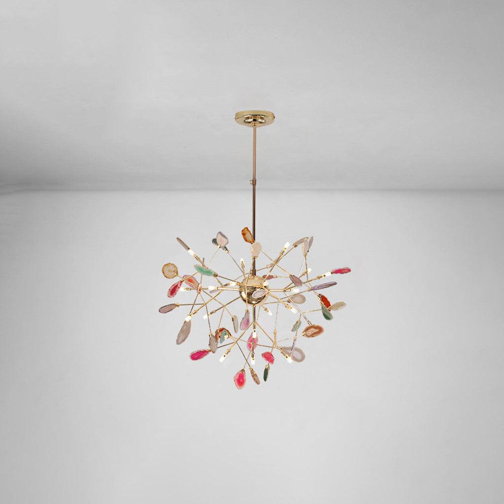 Natural agate chandelier glowing above a dining setting