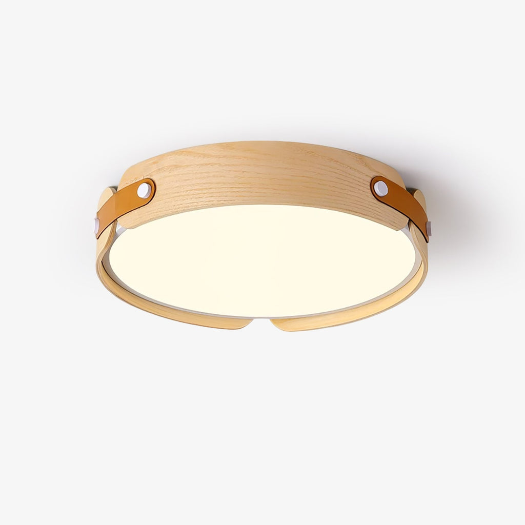 Natural wood flush ceiling light against a pale ceiling